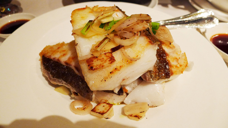 Pan fried cod fish filet with superior soya sauce (tasted bland)
