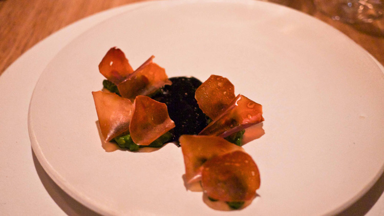 dried scallops with grains in watercress sauce and squid ink