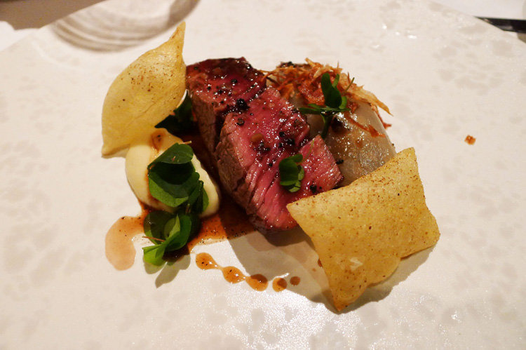 Aged fillet of Cumbrian Galloway beef with onions, truffle and crisp potato