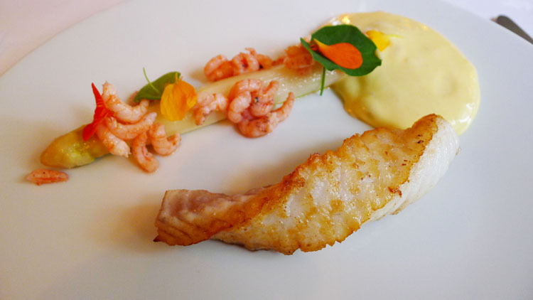 Roasted turbot with white asparagus, sand shrimps and hollandaise sauce