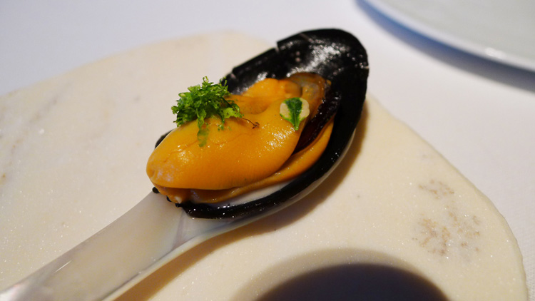Marinated mussel (eaten with it's shell)