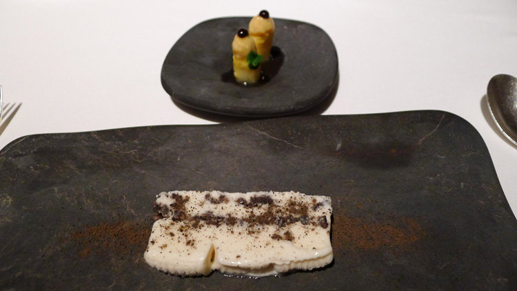 White asparagus ice cream with black truffle, asparagus and black garlic