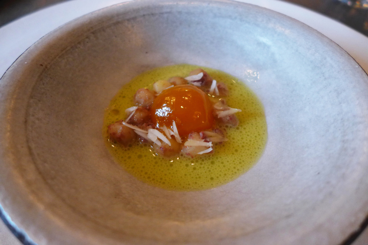 Cured egg yolk with some baby potatoes and nasturtium sauce at Noma, Copenhagen