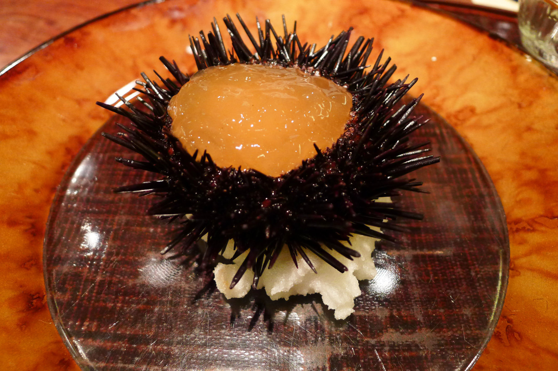 Lightly steamed sea urchin with lobster broth jelly and flying fish roe