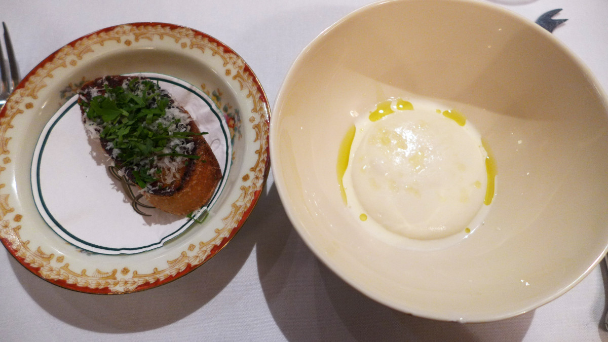 Slightly warm mozzarella with olive oil, served with crostini