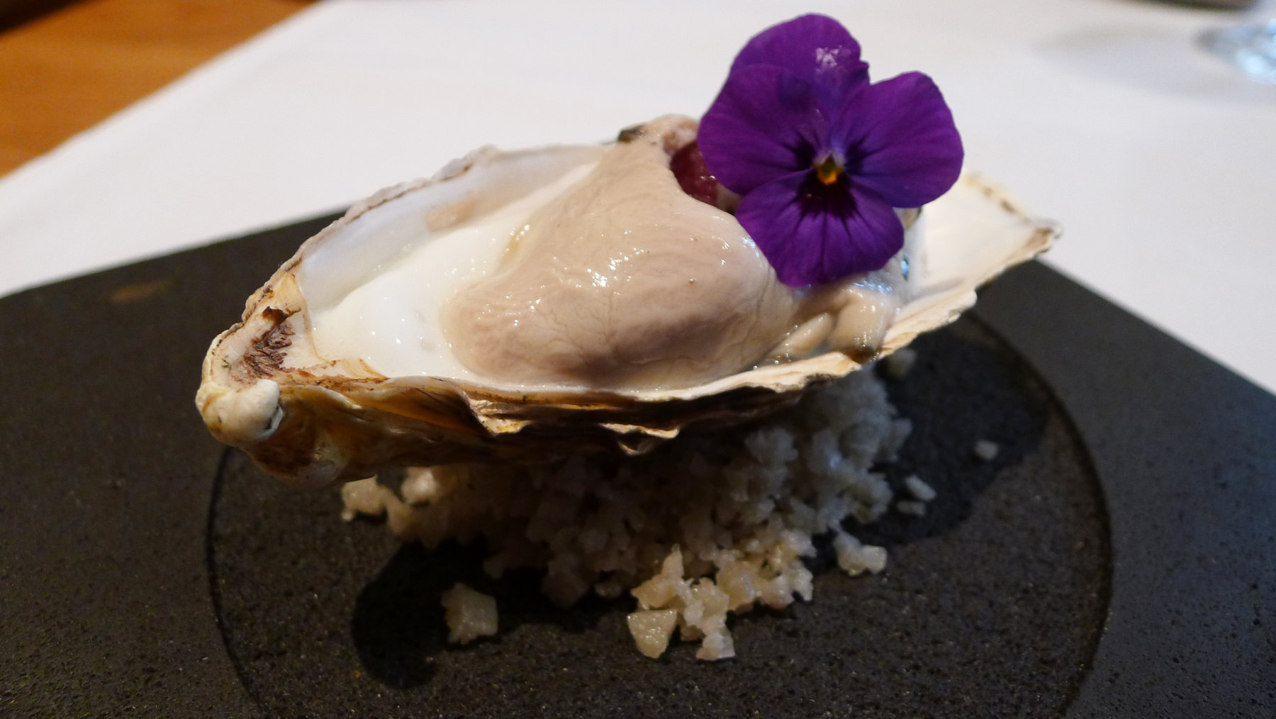 Oyster poached for 45 min, Granny Smith apple foam, pickled shallots