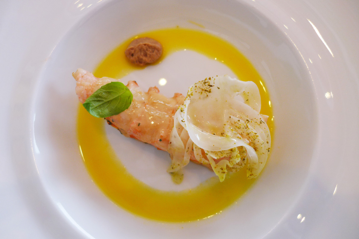 partly cooked "langoustine from the Ligurian sea with sweet tangerine juice and Toritto almond cream"