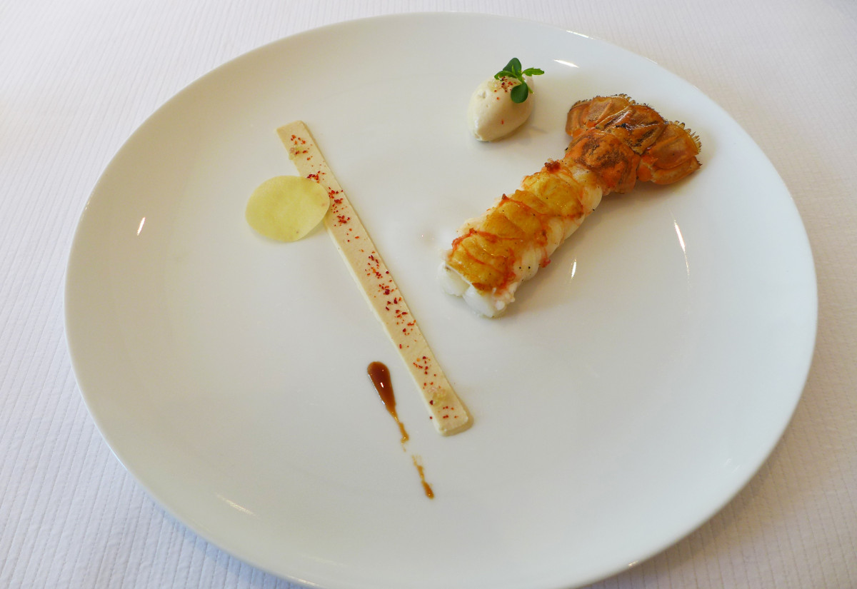 Langoustine with it's reduced "nage" and lemon caviar