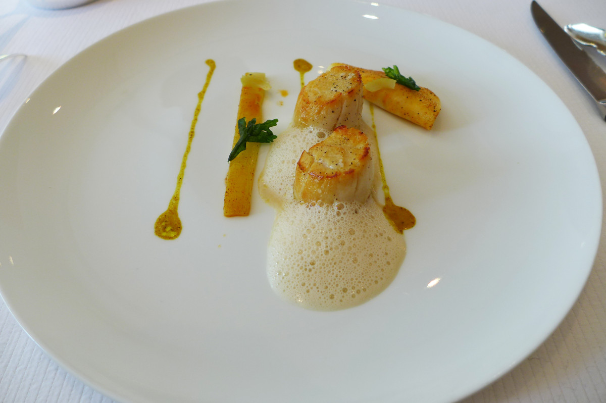 Diver caught scallops with coconut foam and celery