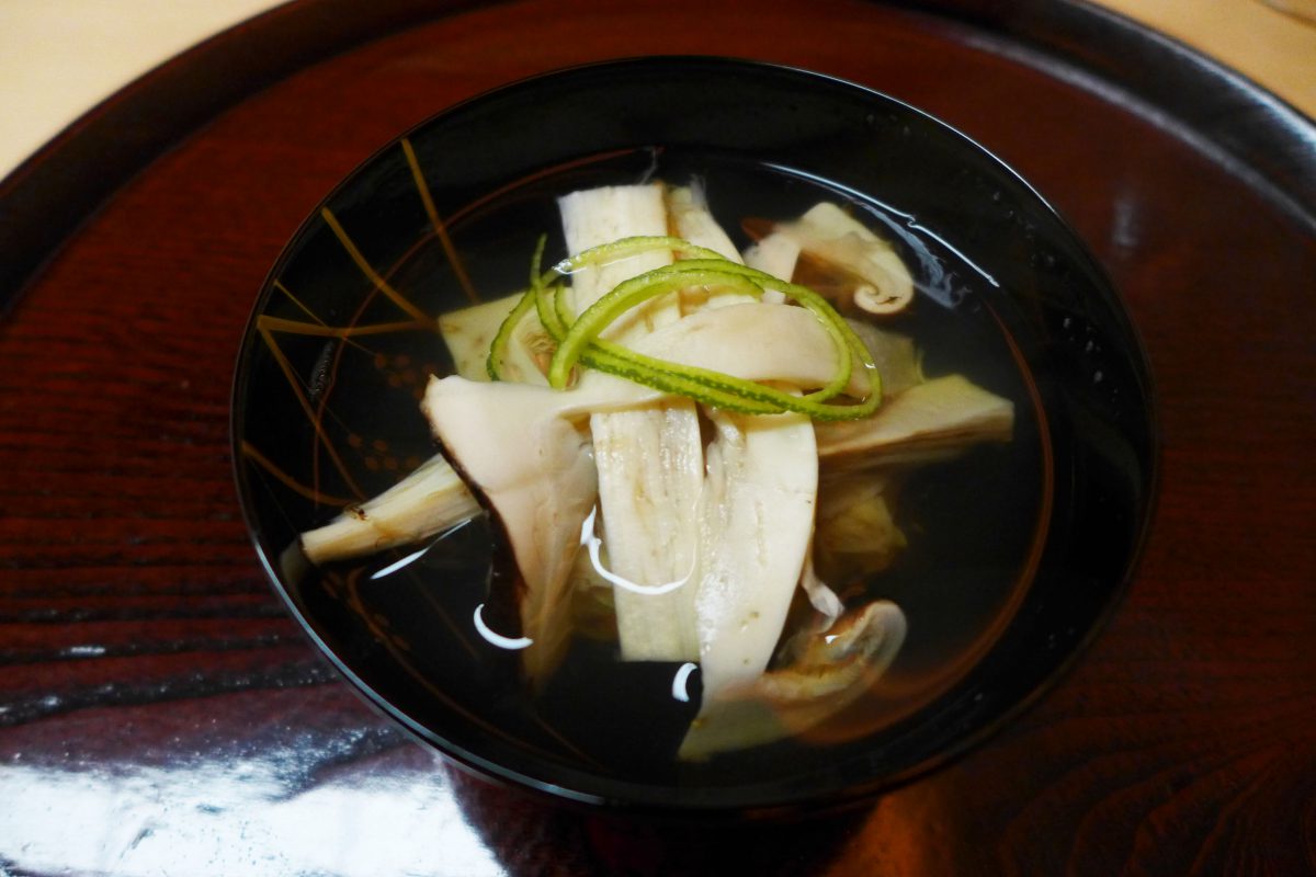 Dashi broth with snow scrab dumplings. matsutake and yuzu zest