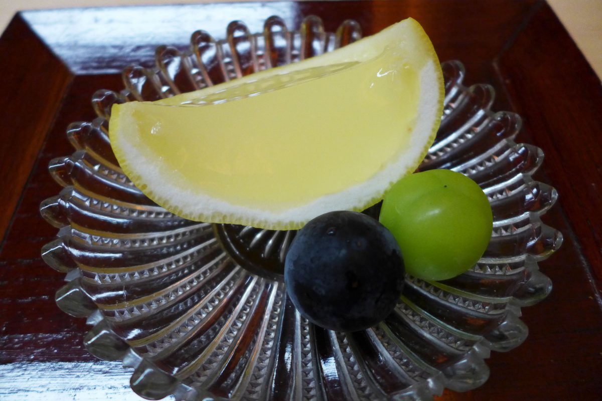 Grapefruit jelly and grapes