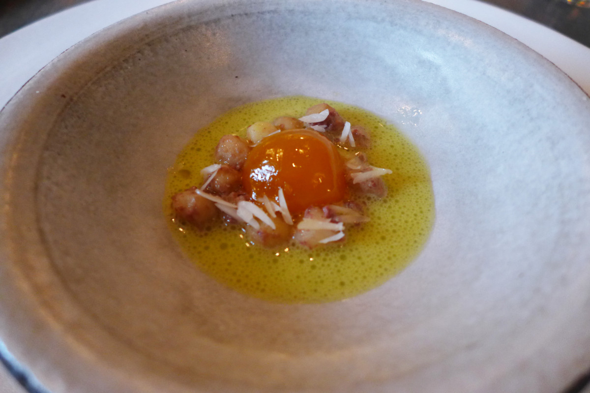 Cured egg yolk, barely cooked potatoes ( size of a hazelnut), nasturtium and rose oil sauce. Everything married so perfectly - this was one of the best dishes I've had in my life.