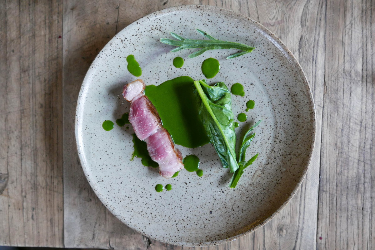 Pork neck with new greens