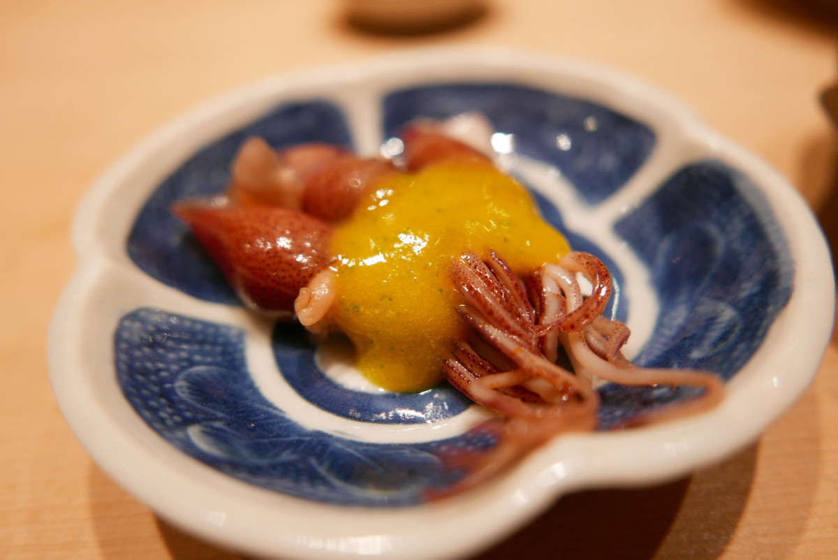 Baby squid with egg yolk sauce