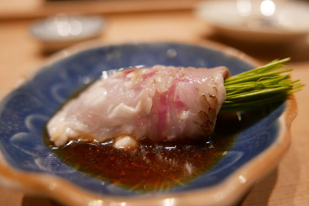 Nodoguro (black throat sea perch) "stuffed" with spring onions