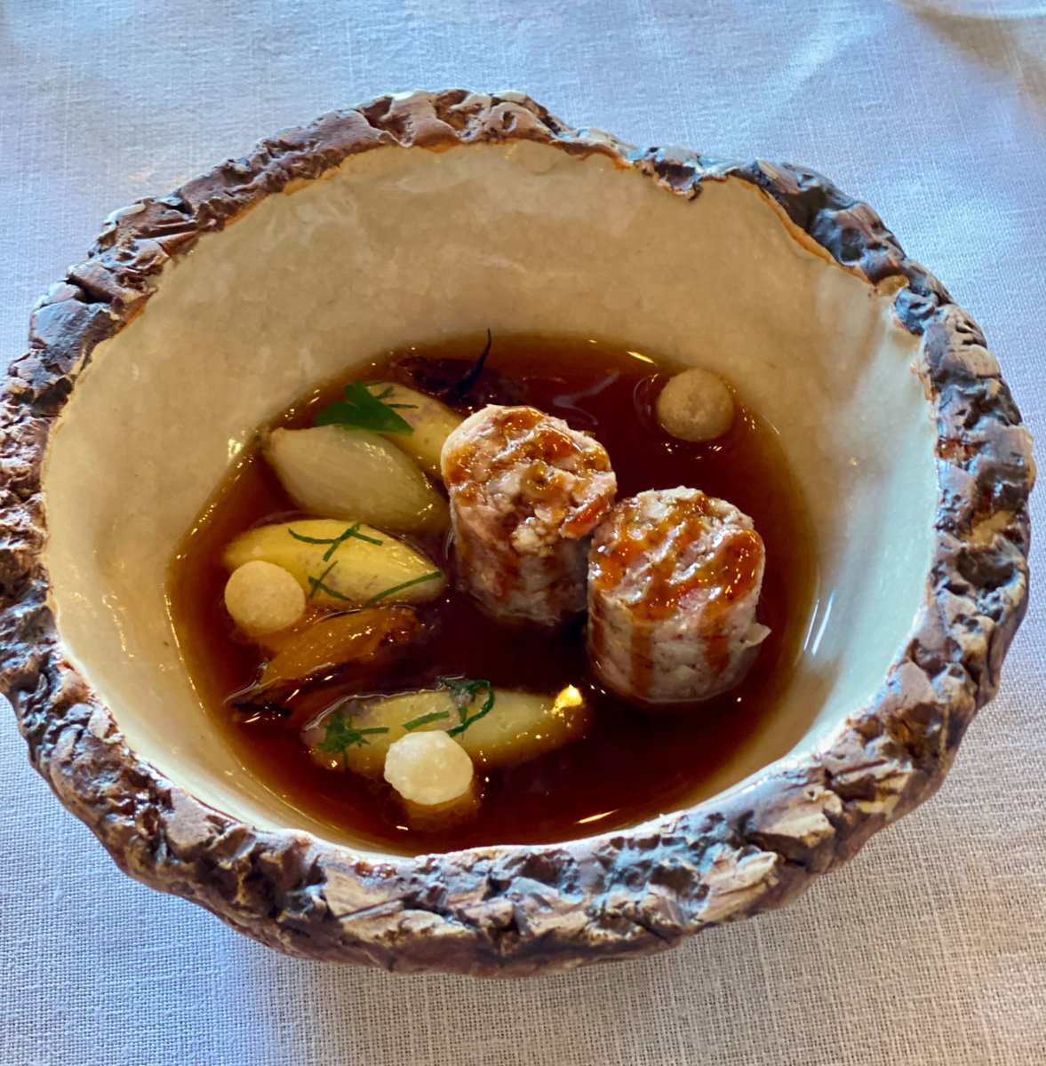 Pork sausage cooked in consommé with boiled potatoes at La Bouitte ( 3*), St Martin de Belleville