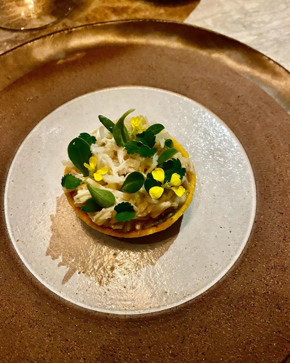 "Enoki and Cornish crab chalupa, pistachio and fermented gooseberries"