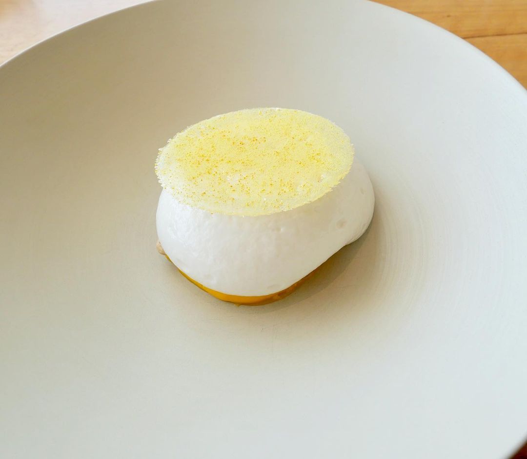 Saffron cream, almond foam and orange sorbet