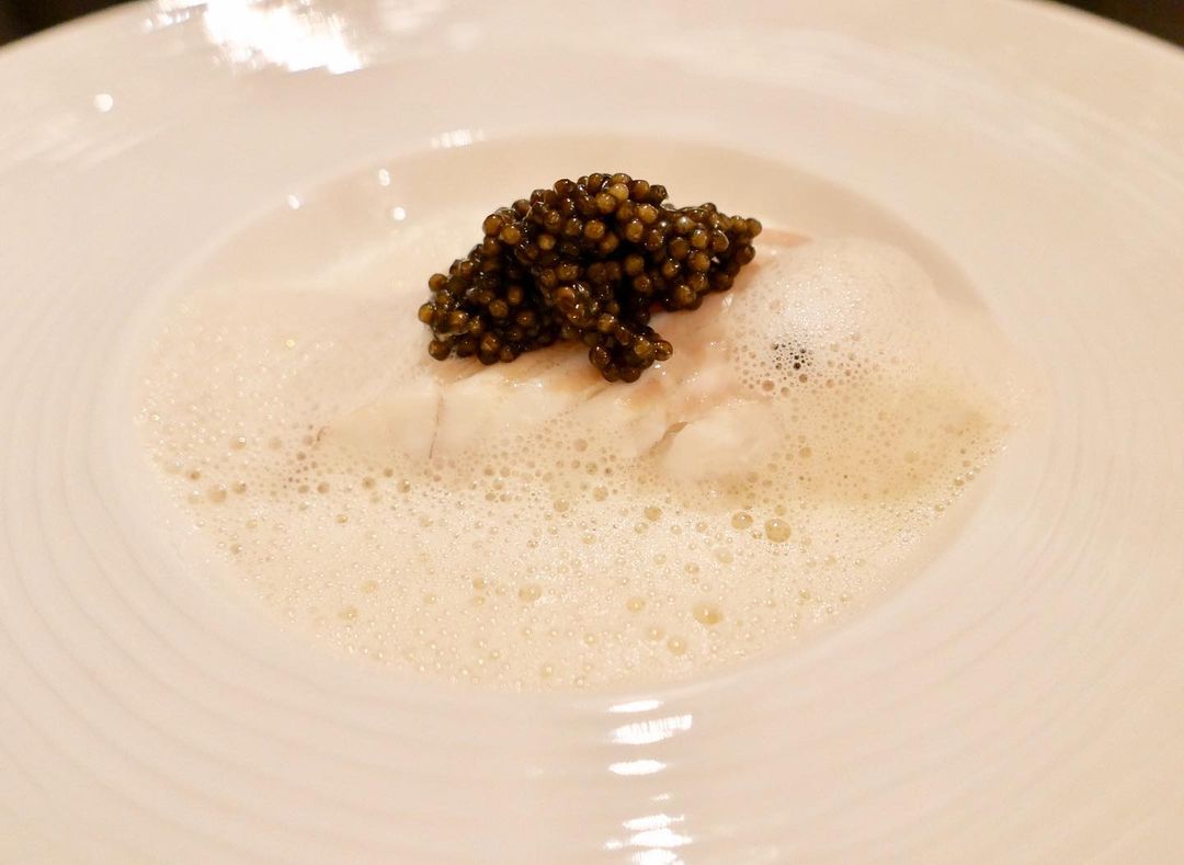 Cornish turbot, coco de Paimpol beans, caviar and champagne sauce