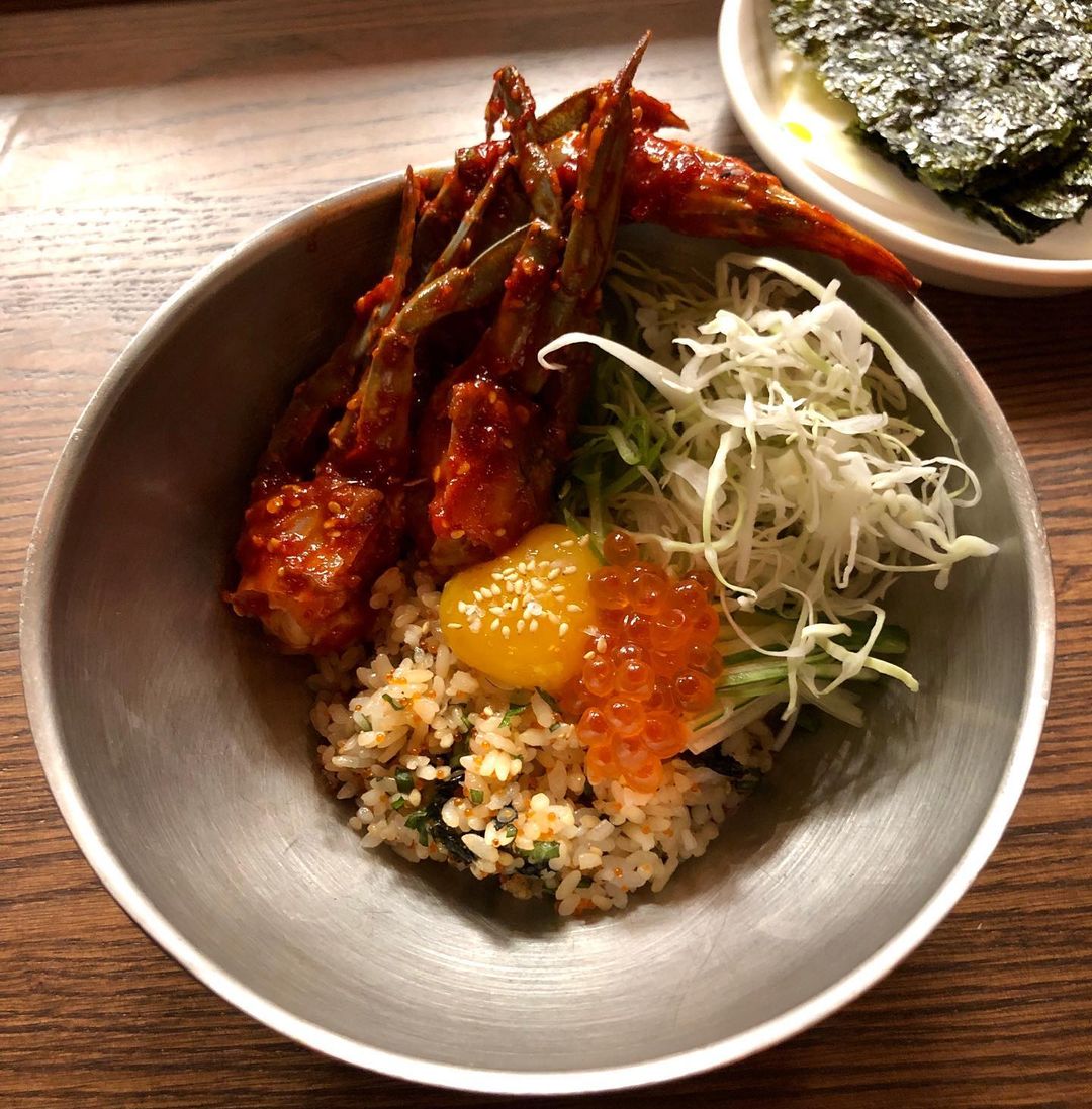 marinated raw crab, rice seasoned with sesame oil, tobiko, perilla, toasted seaweed and egg yolk